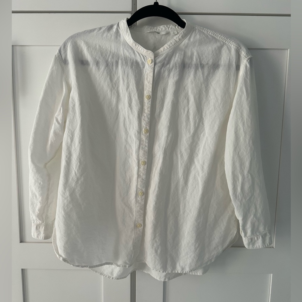 UNIQLO's  White Button-Up Shirt